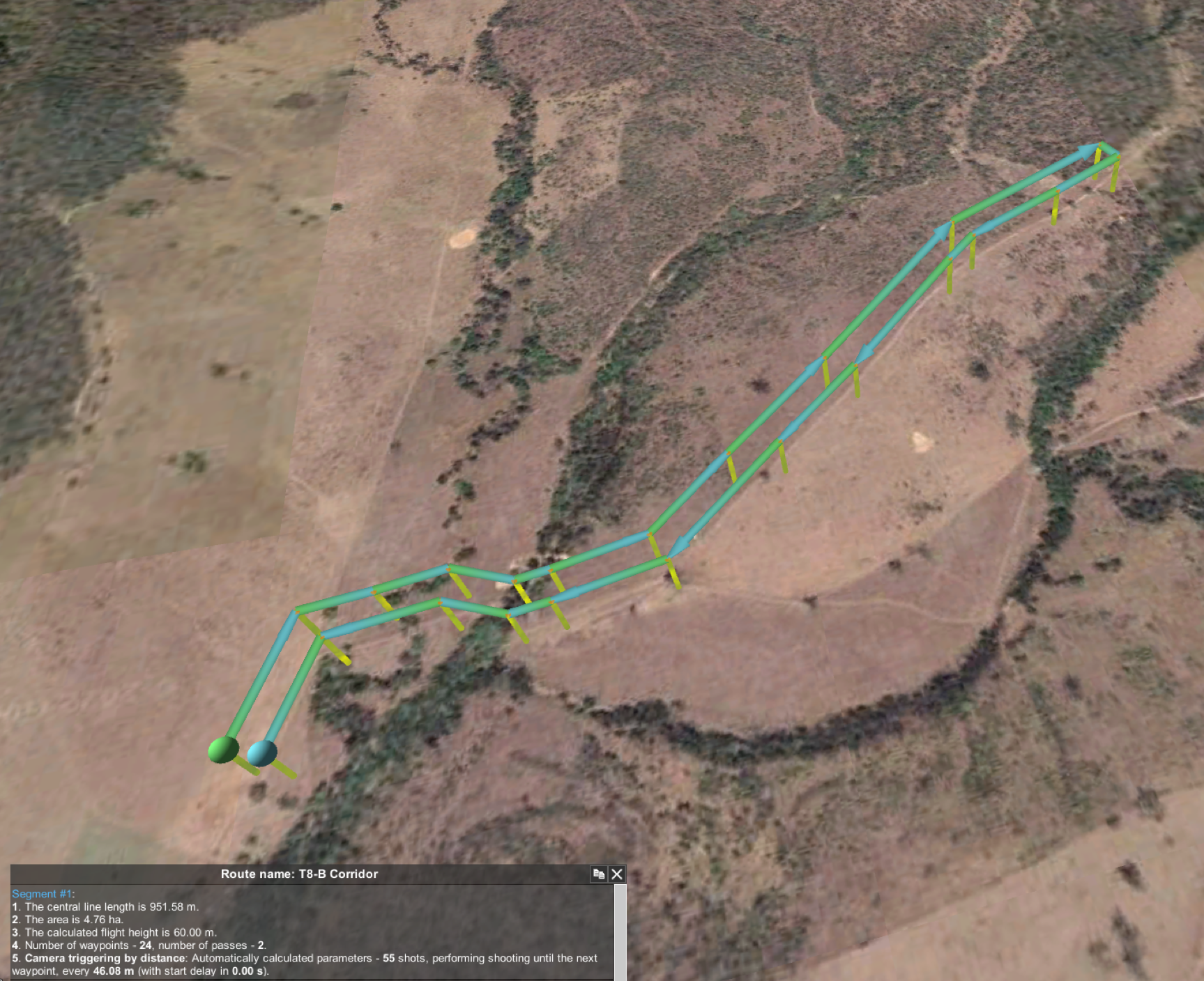 An aerial photo with green lines drawn on it, following a complex route.